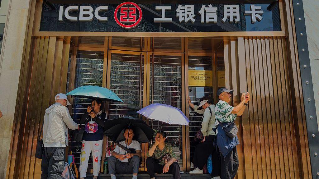 China injects $54bn into state banks and insurers to revive economy