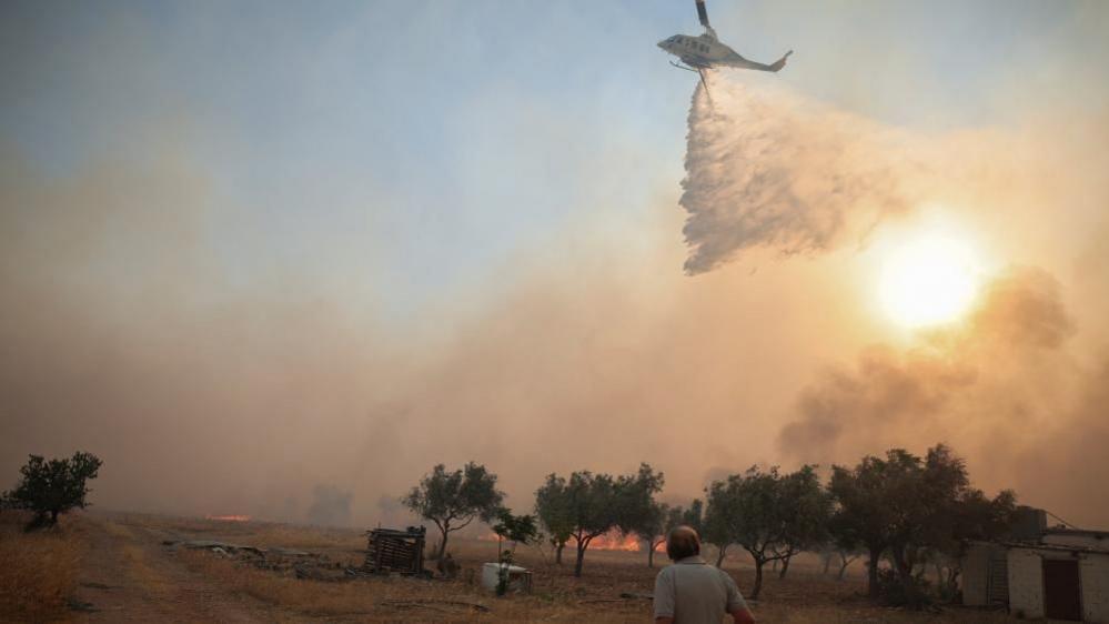 Helicopter Collision Amid Greece Wildfire Battle Leaves Two Critically Injured