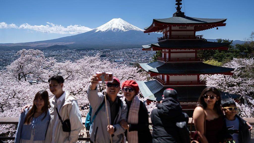 Japan raises permanent‑resident fee 20‑fold, tightening entry rules