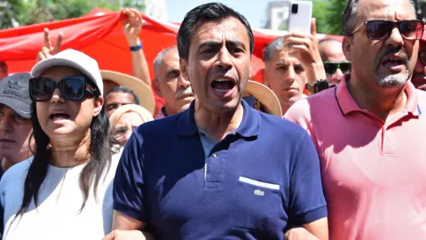 Tunisian Court Sentences Opposition Leaders to Decades in Prison