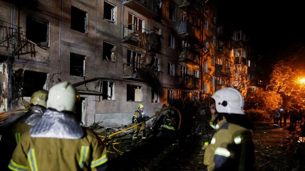 Russian missile strikes on Kyiv kill at least nine, Ukraine officials say