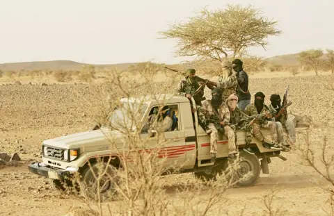 Escalating Crisis: Fuel Tankers Set Ablaze in Islamist Blockade of Senegal-Mali Trade Route