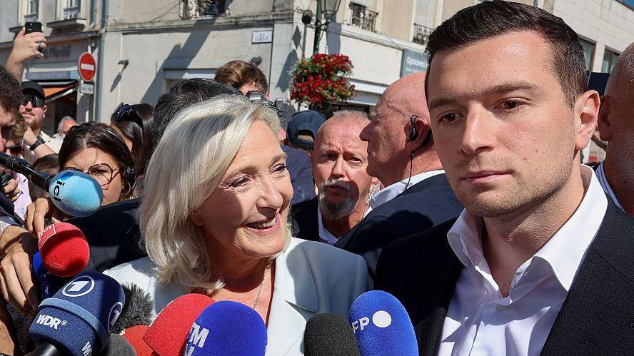 Jordan Bardella Stays in the Shadows as Le Pen Declares 2027 Presidency
