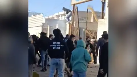 Protests Escalate in Iran: Security Officer Killed Amid Unrest