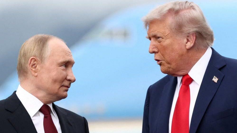 Trump and Putin speaking during an Alaska visit