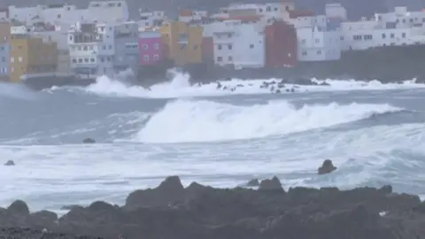 Tragedy Strikes Tenerife: Three Lives Lost in Tidal Surge Incident