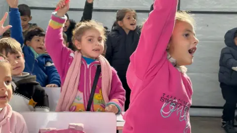 Hope Amidst Chaos: Children in Gaza Return to School After Years of War