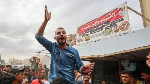 Palestinians Experience Mixed Emotions Amid Ceasefire Deal