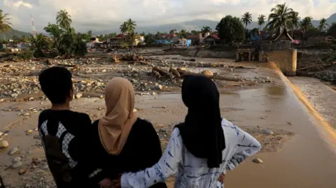 Indonesia Struggles to Find Over 400 Missing After Catastrophic Flooding