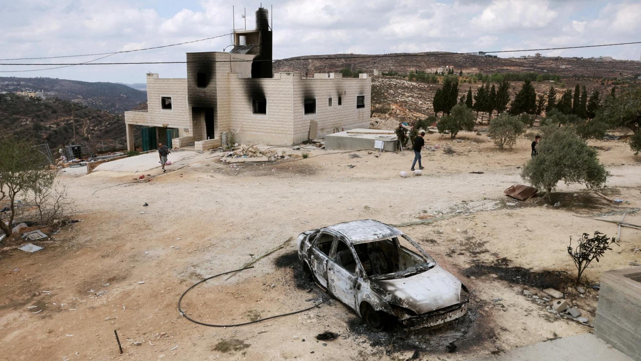 Settlers burn homes and block families from West Bank village after court ruling