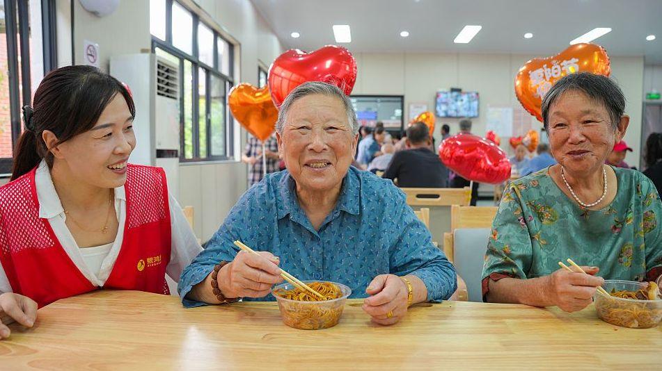 Elderly residents at a community care centre during the Double Ninth Festival