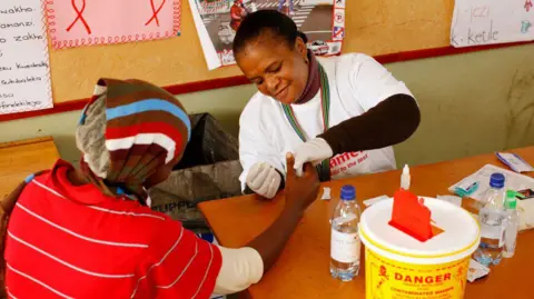 US Halts Aid to South Africa’s HIV‑Fighting Effort