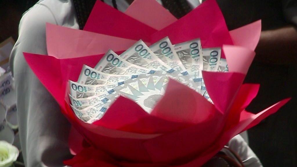 Seven Women Arrested for Making ‘Money Bouquets’ in Ghana