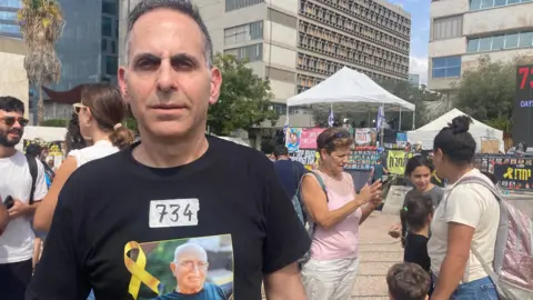 Heartfelt Plea from Hostage's Son: 'It's Not Over'
