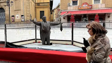 Controversy Erupts as Pavarotti Statue Gets Encased in Ice in Italy