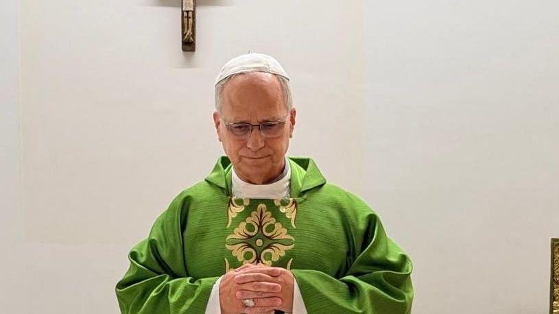Pope Leo in green robe celebrating Mass from hospital ceiling, Rome