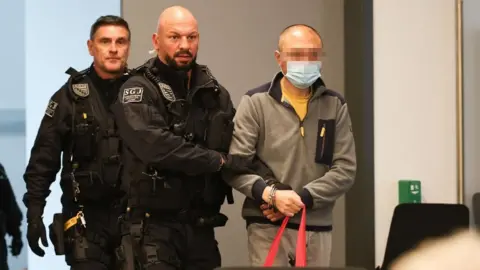 German Aide Sentenced for Espionage Ties with China