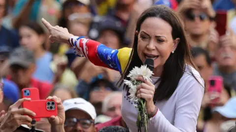 Venezuela Threatens Opposition Leader with Fugitive Status Over Nobel Prize