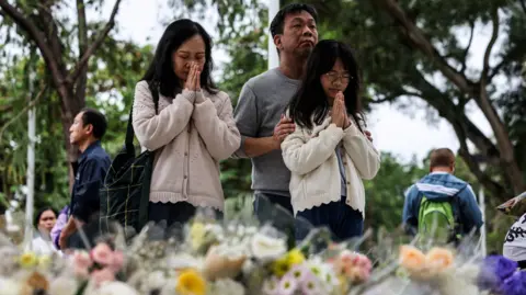 Tragic Fire in Hong Kong Claims 146 Lives as Community Unites in Mourning