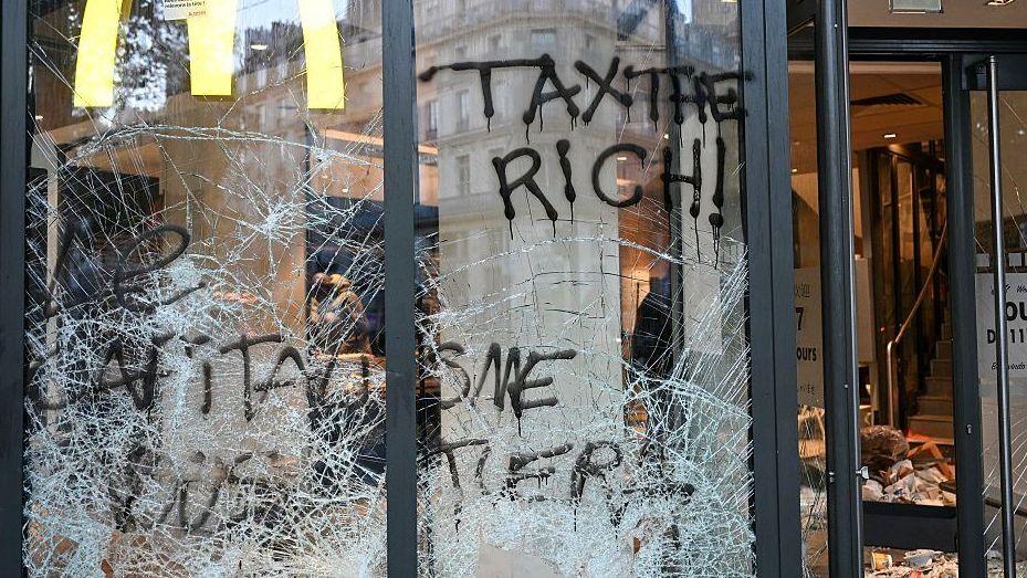 Vandalised shopfront in Paris after the demonstrations